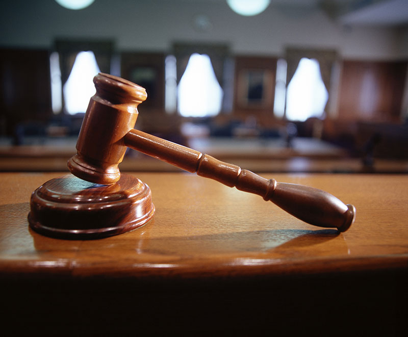 Gavel on desk in office